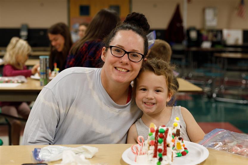 Families enjoying holiday activities